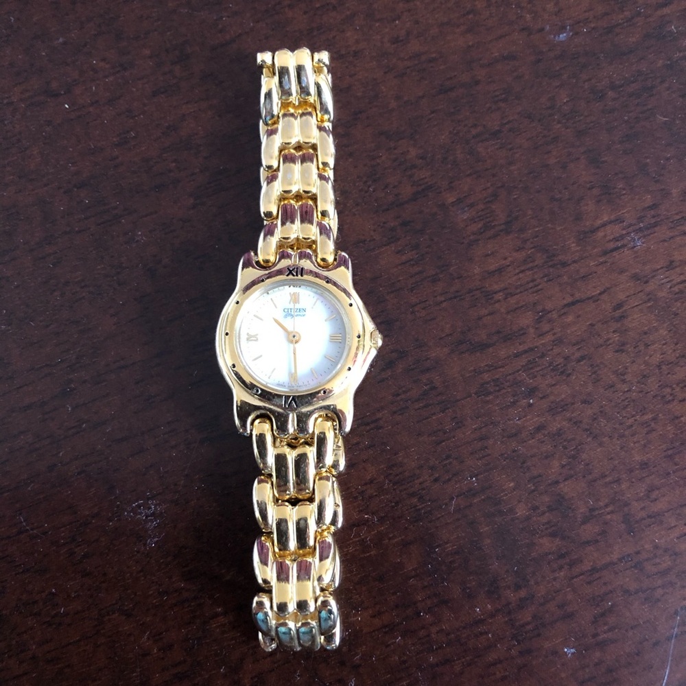 Ladies Citizen Watch w/Gold Tone Link Band & Rainbow Pearl Round Dial